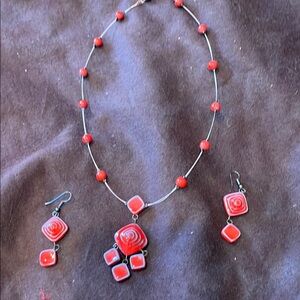 Elegant Red Beaded Necklace with Floral Pendant